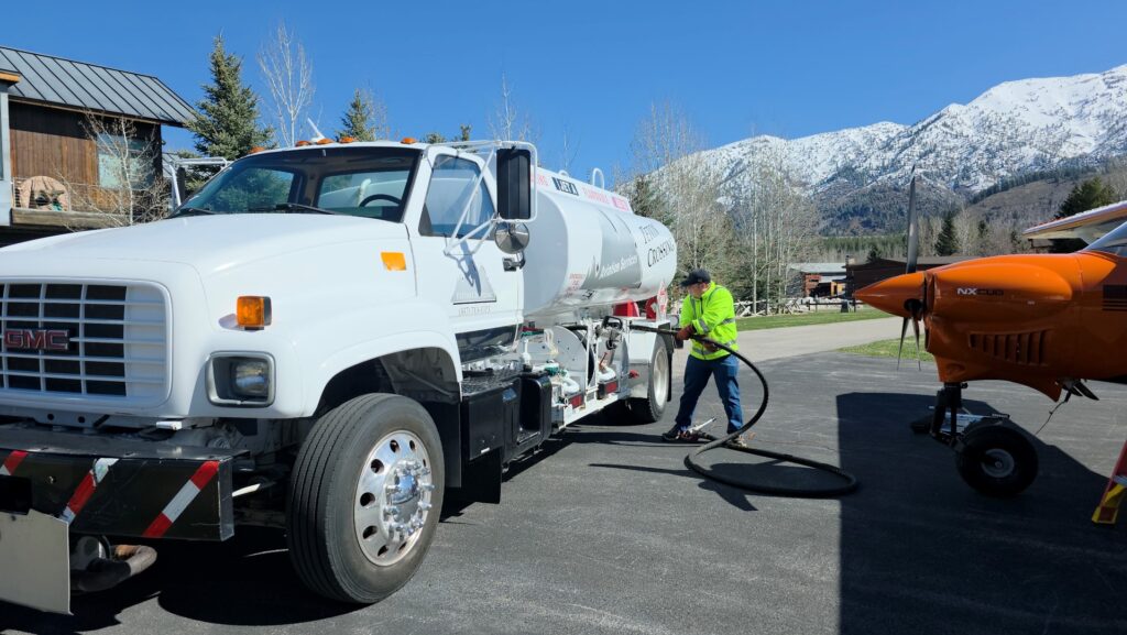 Isaac Miller fueling a private plane at Alpine Airpark 46U, a premier fly-in community near Jackson Hole, Wyoming